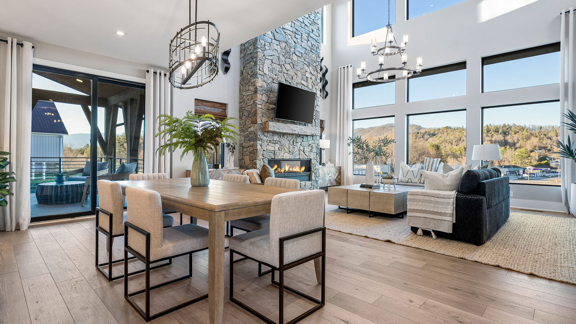 Cozy living room with open floor plan and large windows